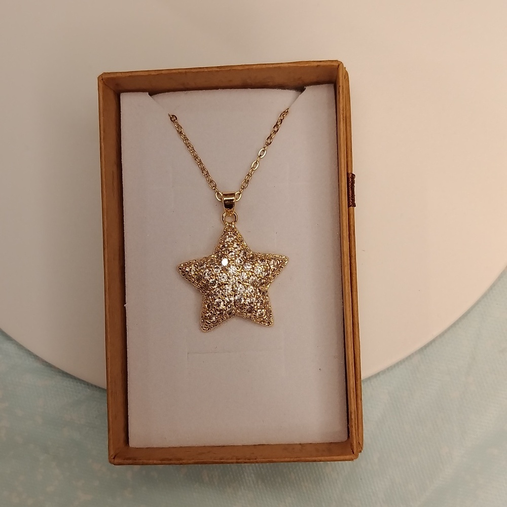 Gold sparkly puffy star